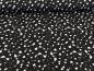 Preview: Baumwolljersey Weiße Farbkleckse auf Schwarz 35 x 150 cm